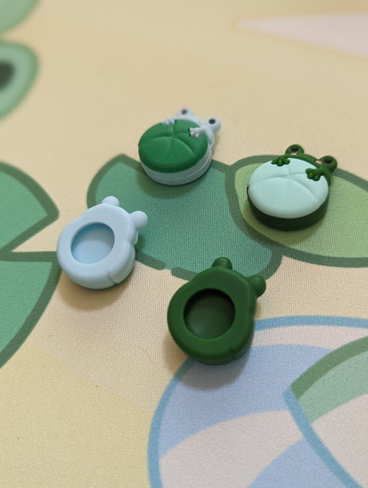 Frog on the lily pad thumb grips