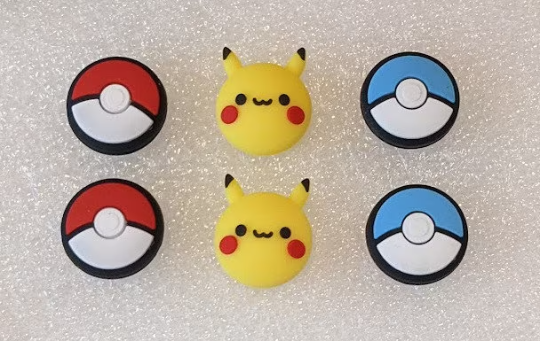 Pokeball thumb discount grips